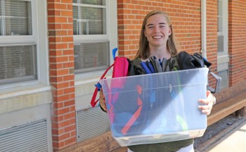 Anna Price with backpacks