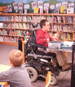 Volunteer reads to class