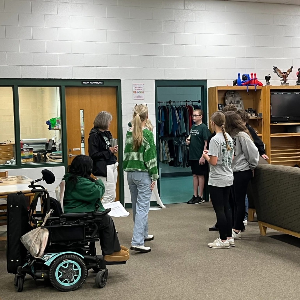 tour group and guides in library