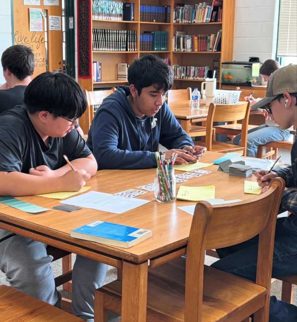 students completing sticky note poetry