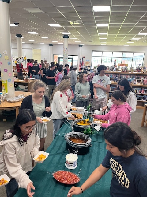 students serving themselves at the tot bar