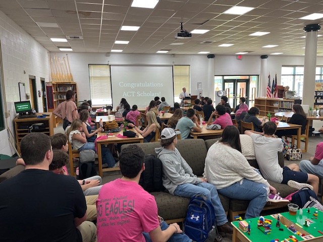 students listening to Mr. Scott speak