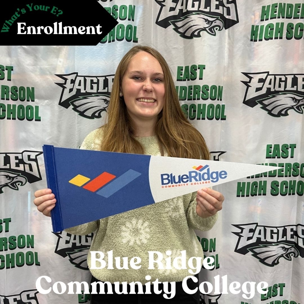 Emma's enrollment photo with penant