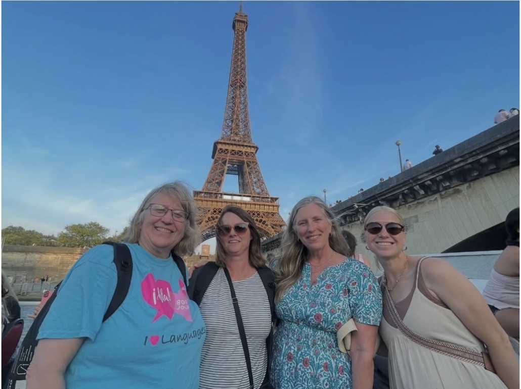 chaperones in front of Eiffel Tower