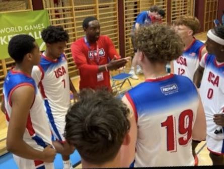 Coach Jones explaining something to the team