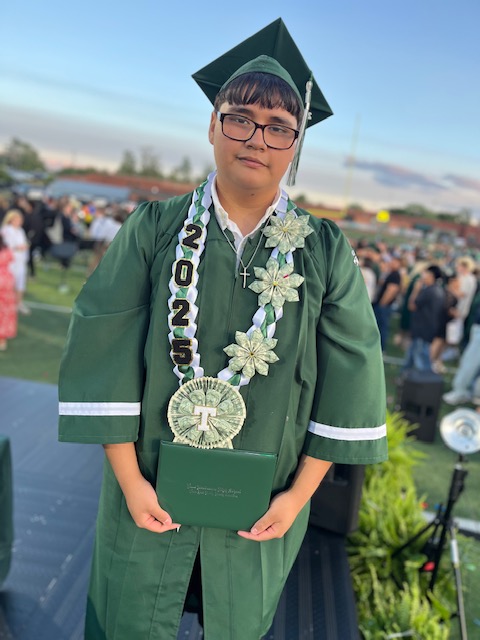 Leithan with money necklace on