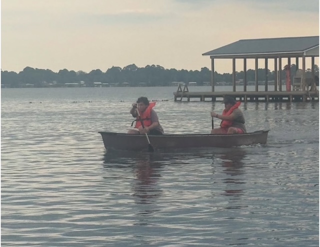 students canoeing