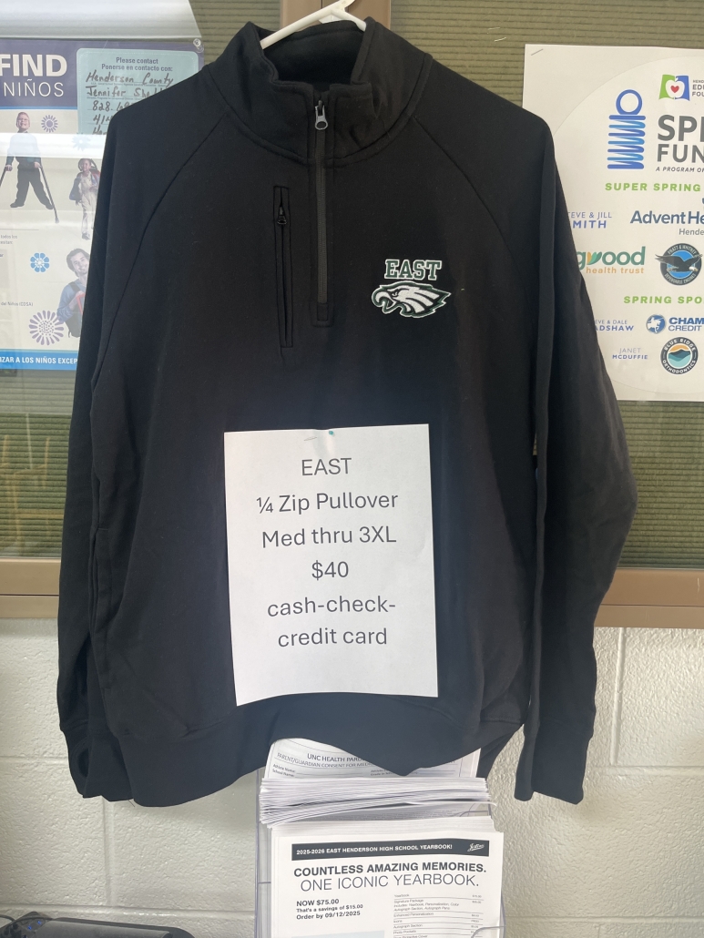 East pullover with sizing sheet attached hanging up