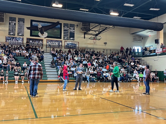 trivia game participants on gym floor