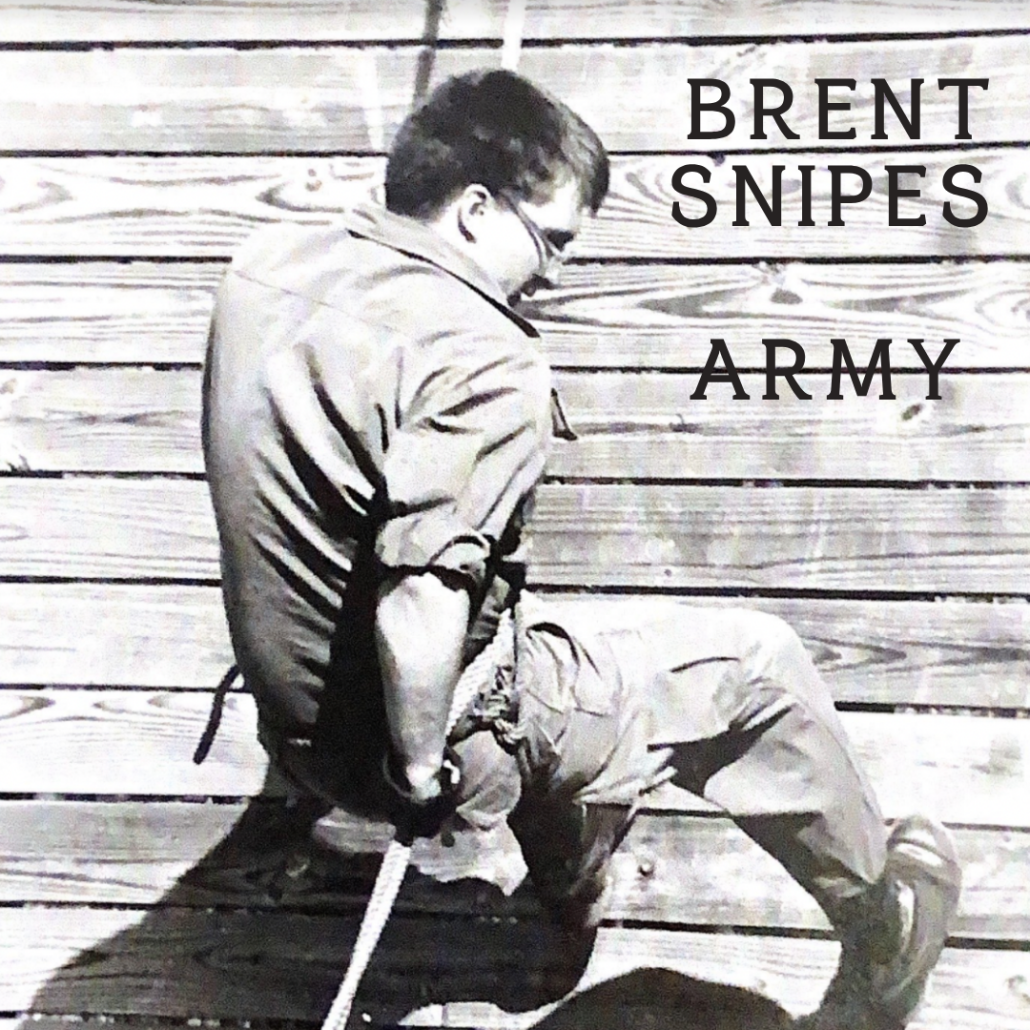 Mr. Snipes scaling a wall