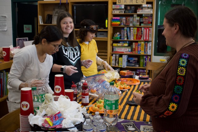 SGA food table students working
