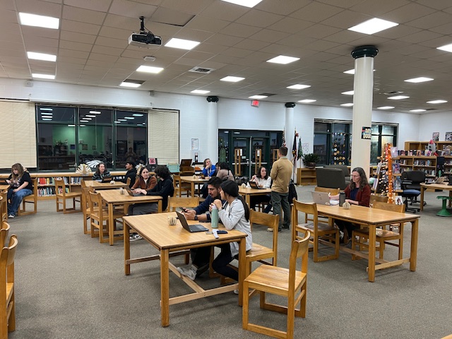 FAFSA night participants at tables working