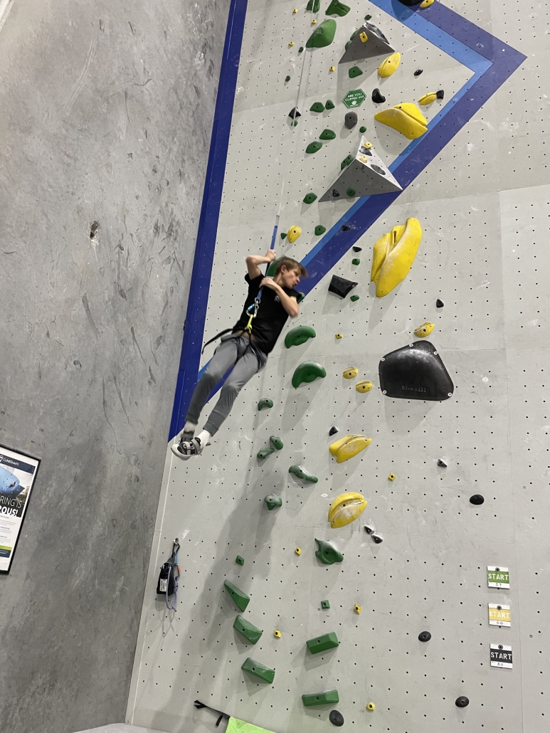 Jeremiah dangling from his support rope