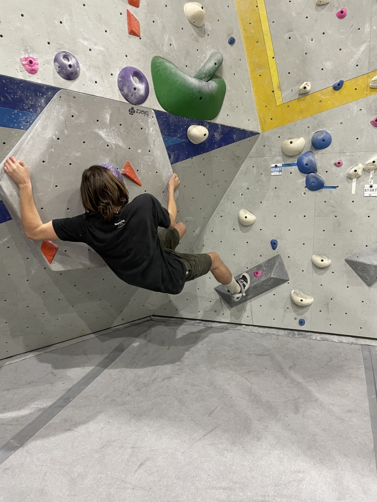 Tyler slimbing upside down