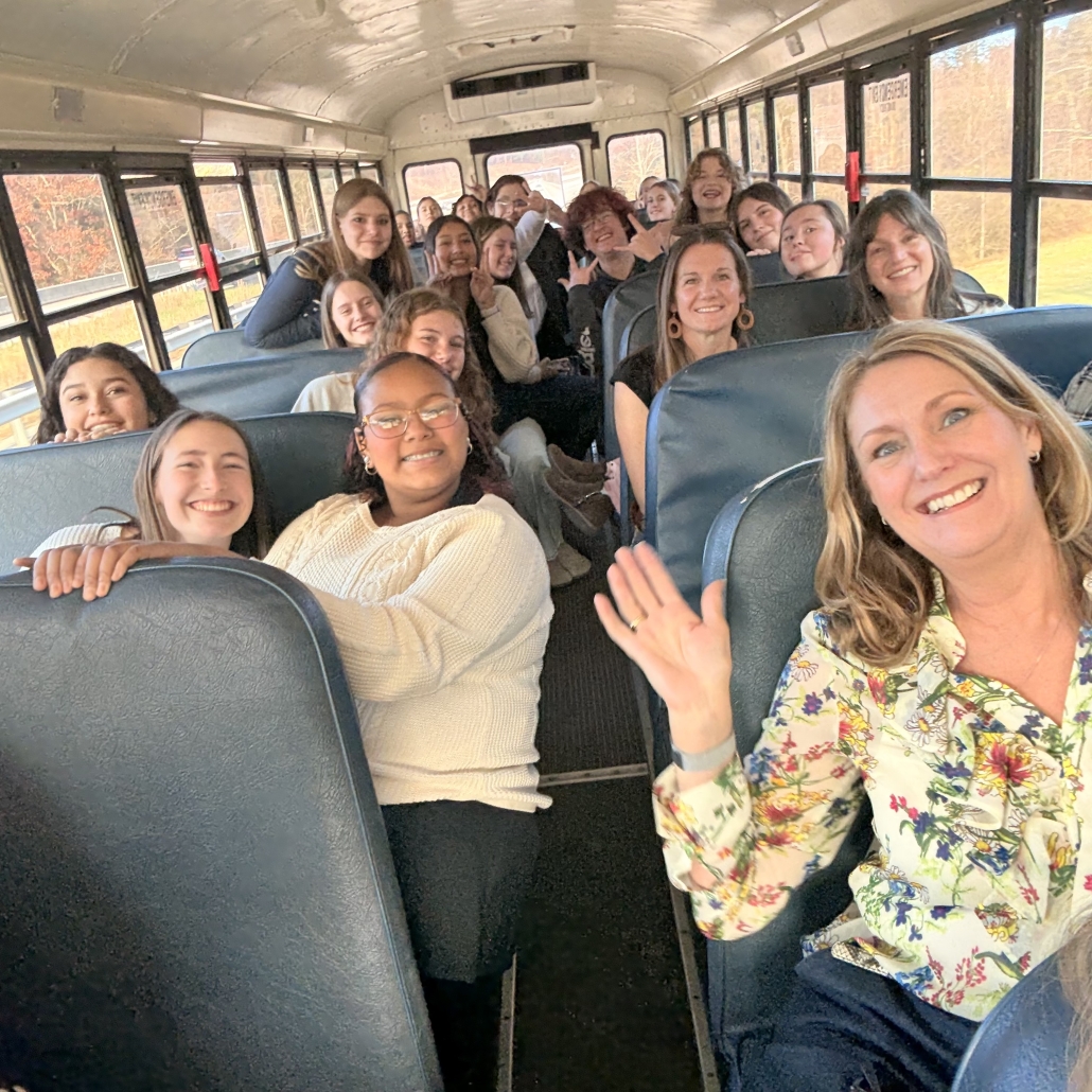 Students and chaperones on the bus