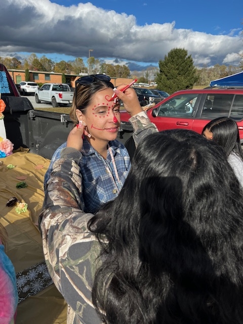 Ms. Bosch getting her face painted