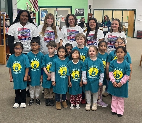 seniors with kinders in their shirts