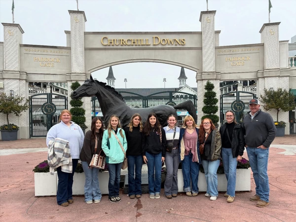 livestock team in front of Churchill Downs