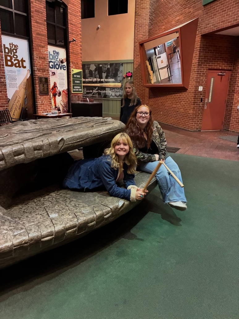 Students inside giant mit at L.S. museum