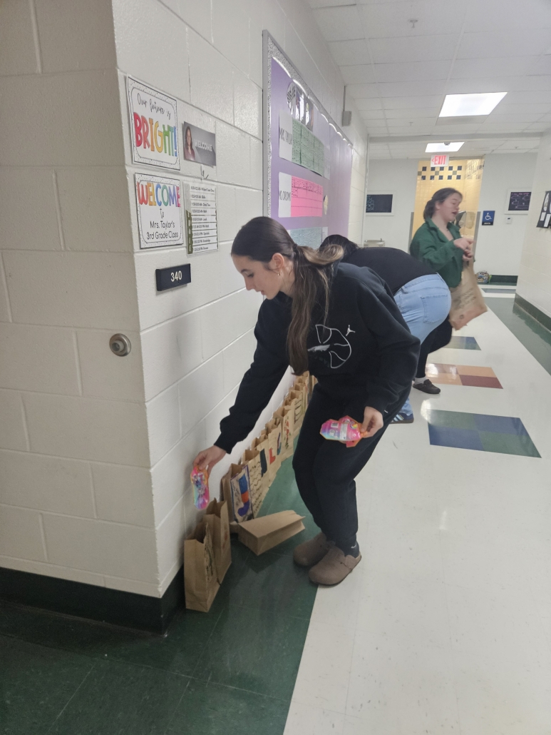 AG filling a paper bag