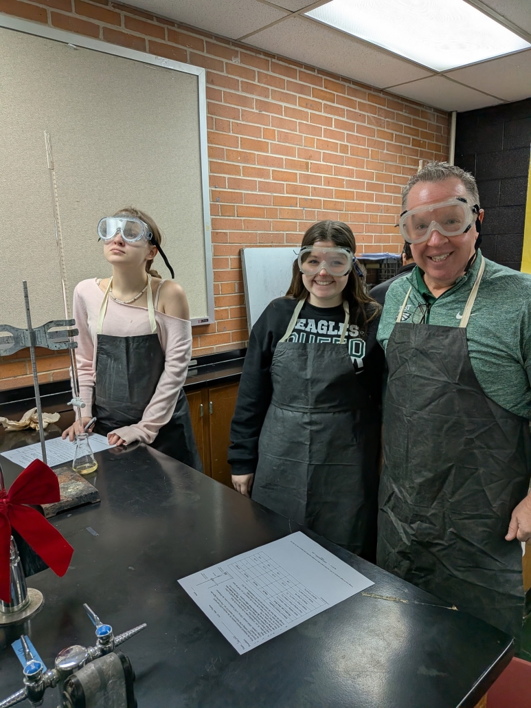 Mr. Scott with Skyley and Jade in lab gear