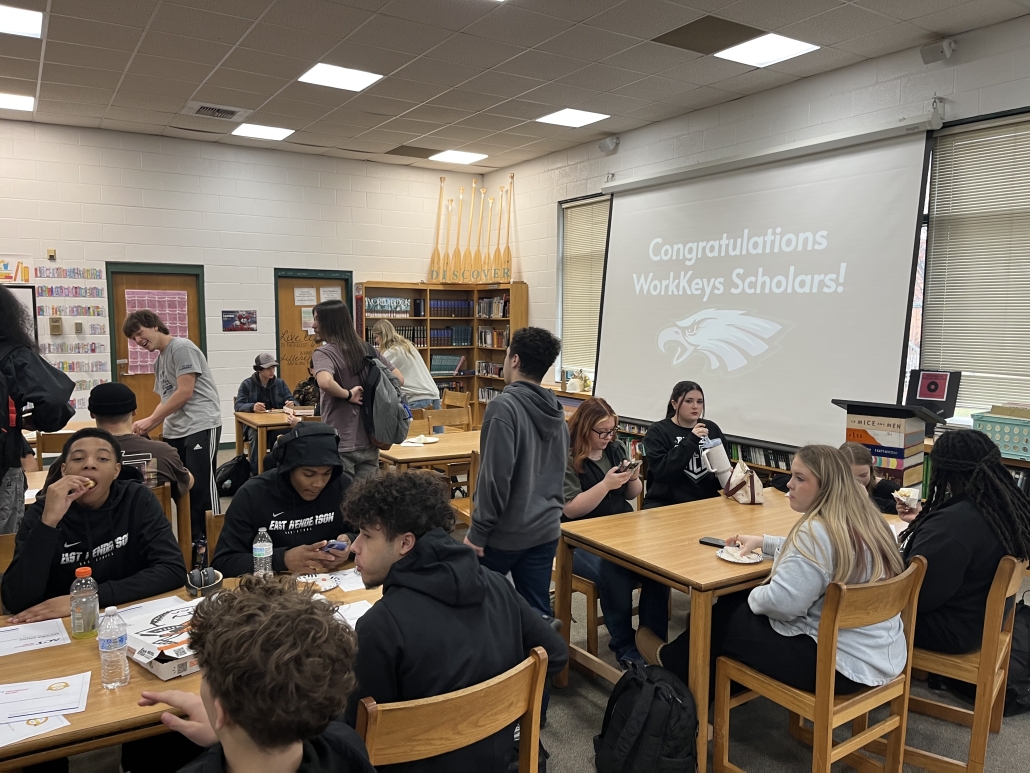 Students at tables at Workkeys celebration