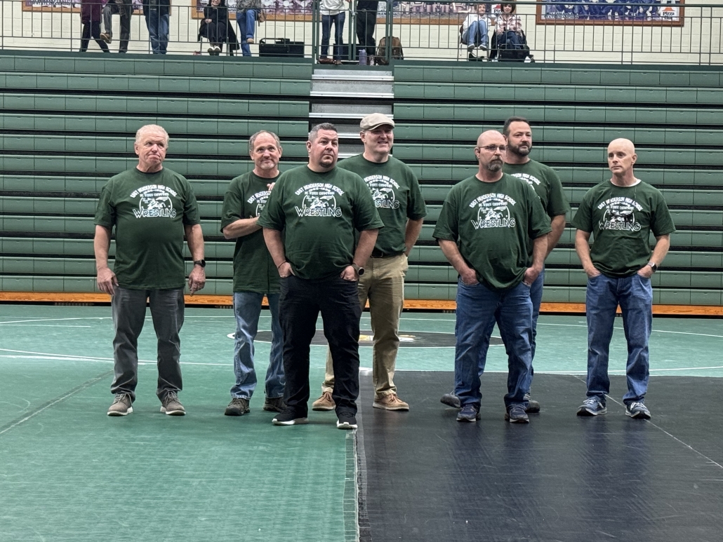 State Champs from 95-96 being recognized on the mat
