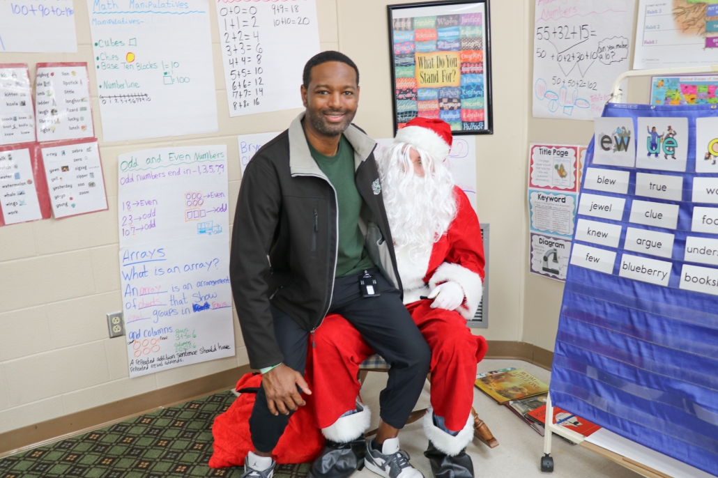 Coach Jones on Santa's lap