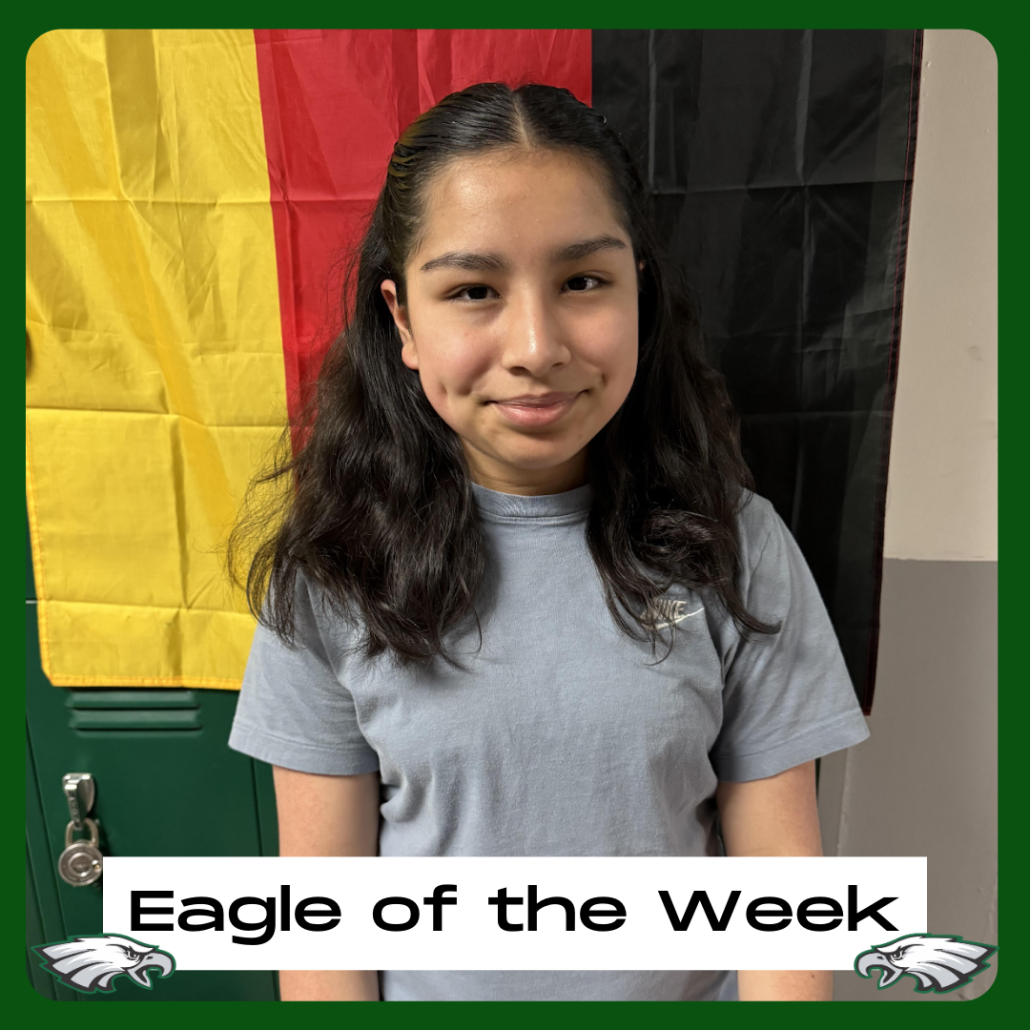 Availy in EOTW frame with flag behind her