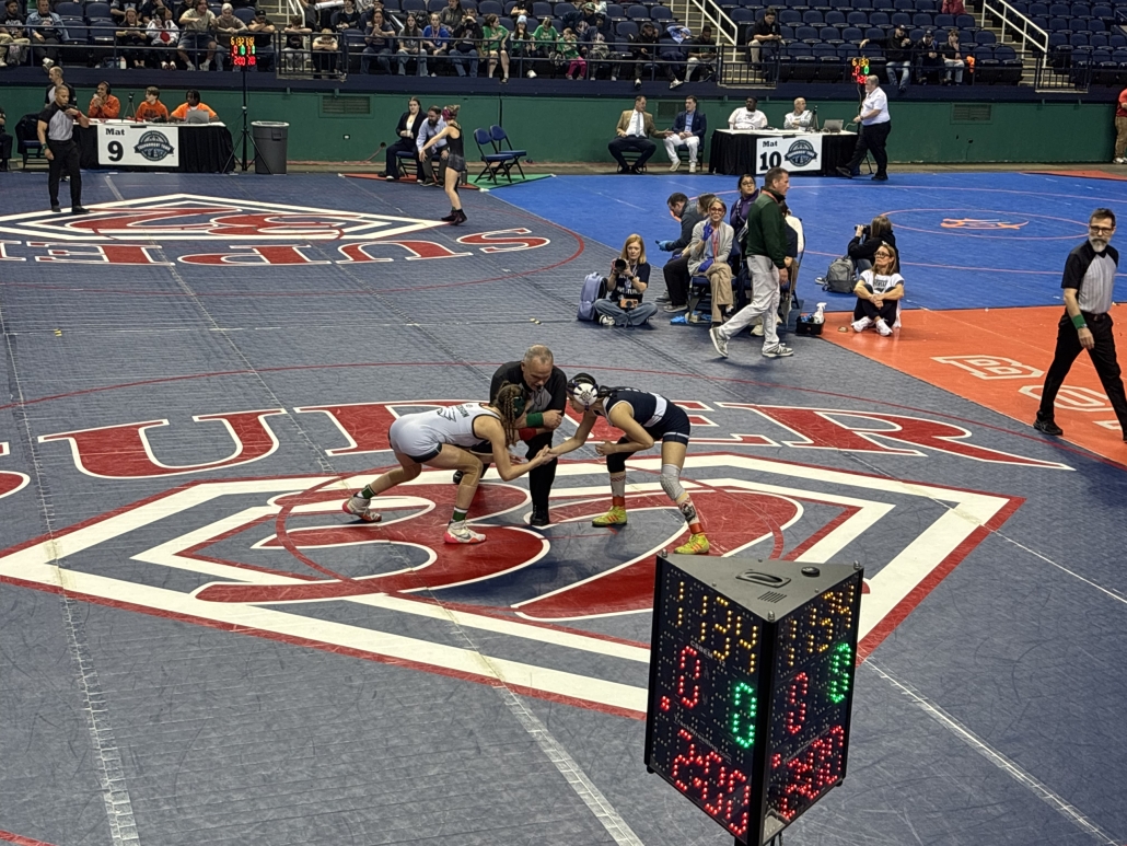 Mia in the ring, ready to wrestle for 1st