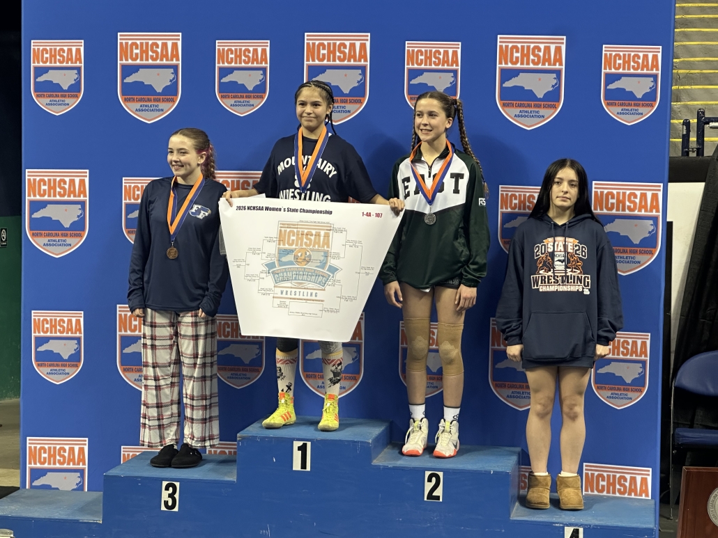 Mia and other girls on the podium at state