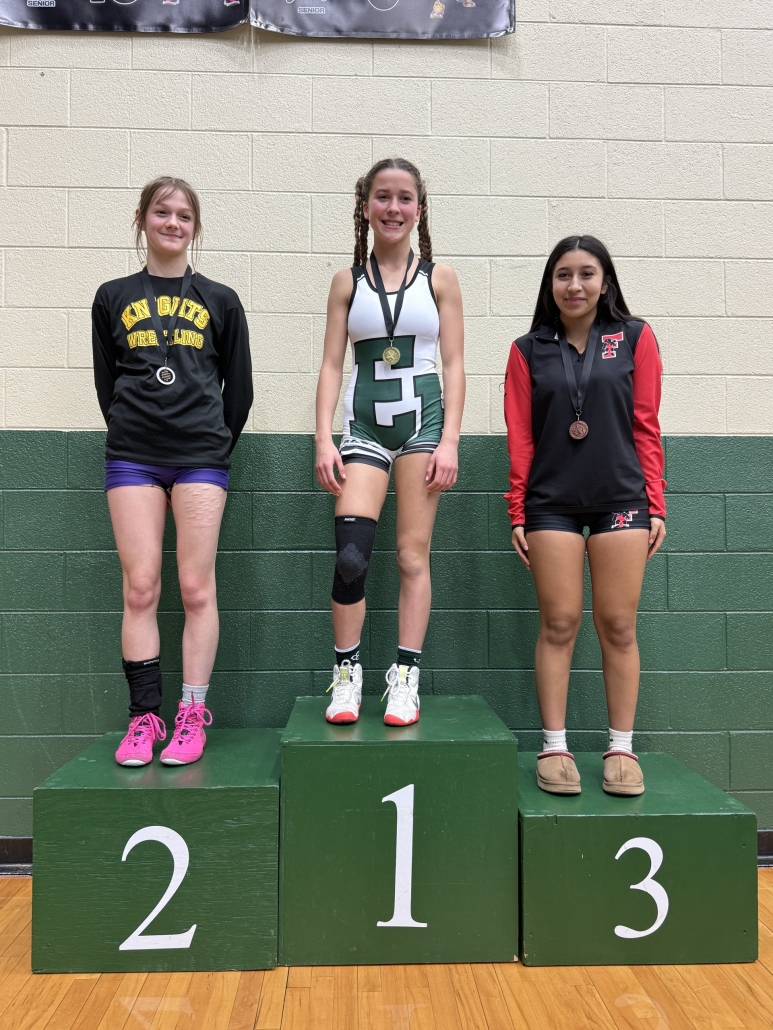 Mia on the winners stand in 1st place