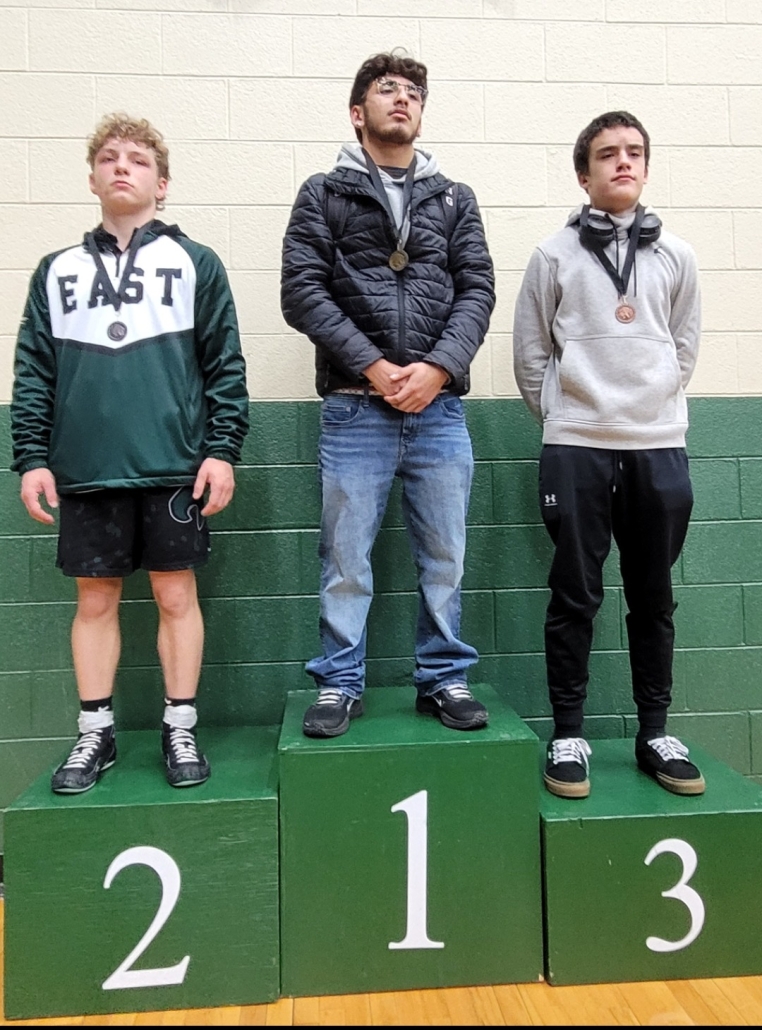 Logan on the winners stand in 2nd place