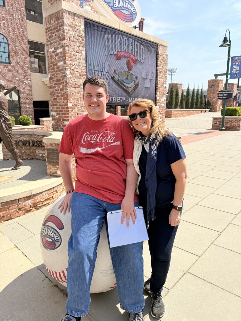 Nickle with Ms. Cullen sitting on ball
