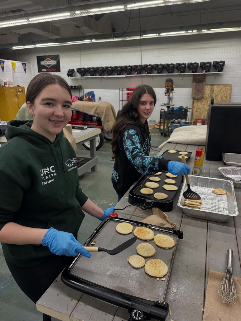 Amber & Morgan making pancakes