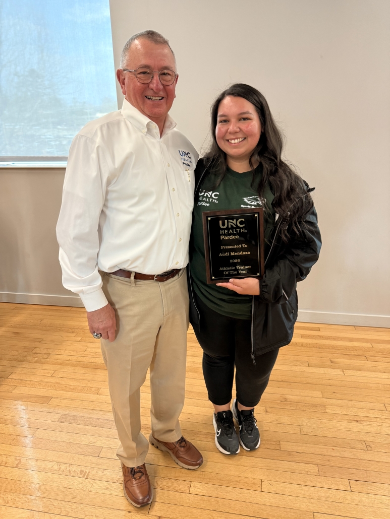 Doc Durham and Audi with her award