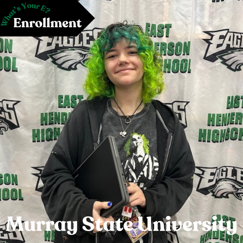 Zocea's Enrollment photo with chromebook and keys in hand