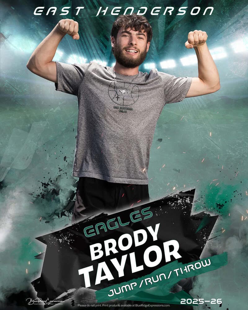 Brody flexing his arms in senior banner
