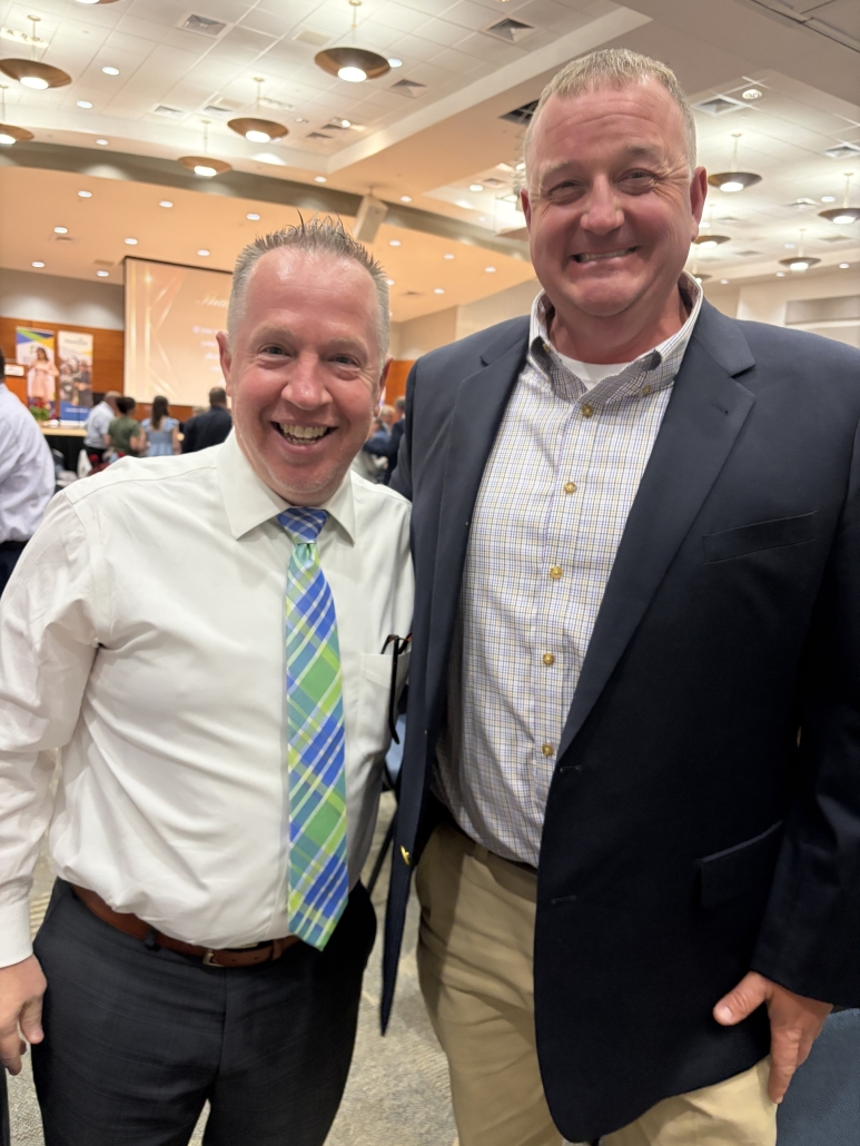 Mr. Scott and Mr. Rollins at banquet