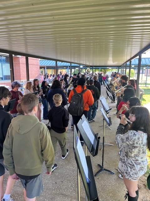 8th graders walking through band tunnel