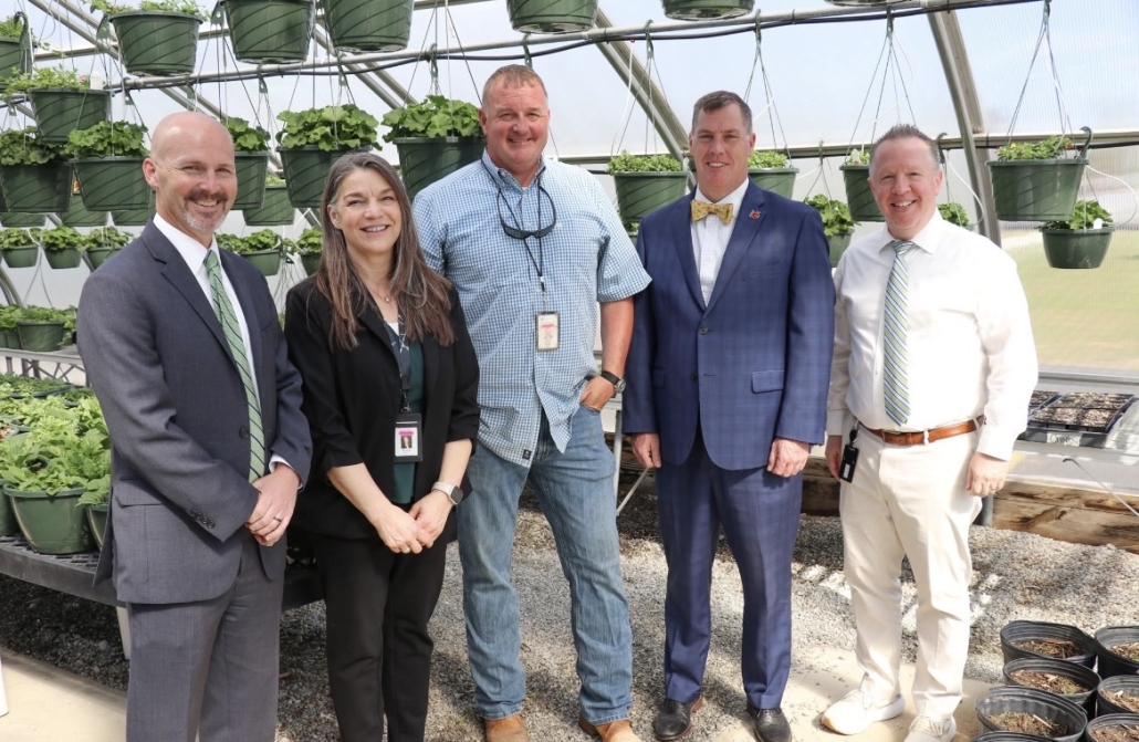 Mr. Rollins with Dr. Taylor, Dr. Marlowe, Mr. Garrett & Mr. Scott in greenhouse