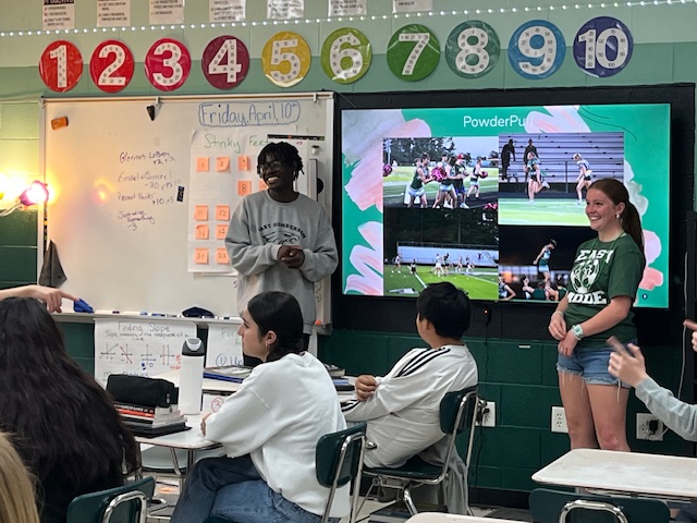 Kiori and Leila presenting to a class