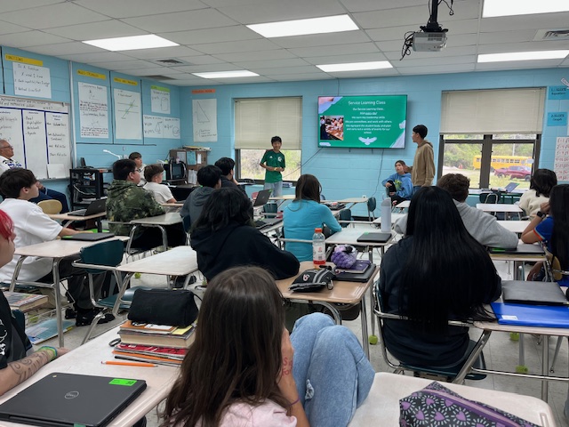 Emanuel and Elisander presenting to a class