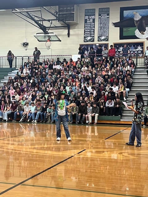 Jade & Nicki emceeing with 8th graders behind