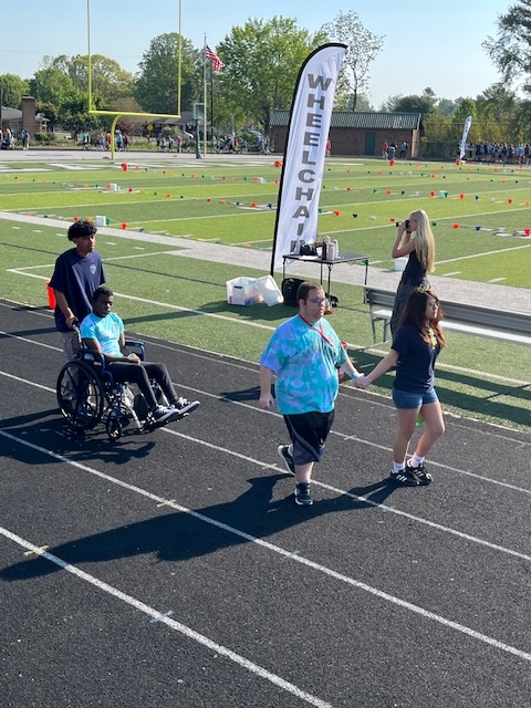 William & WIll with buddies walking in parade