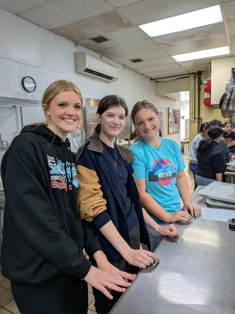 Meagan, Katie & Silvyn at culinary table