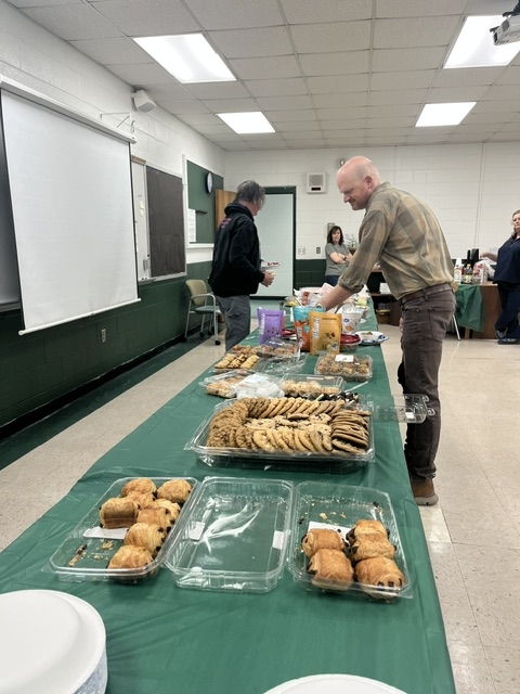 Mr. Maynard & Mr. Merkle getting breakfast
