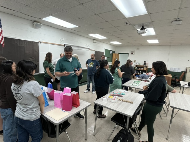 Teachers going through giveaway line