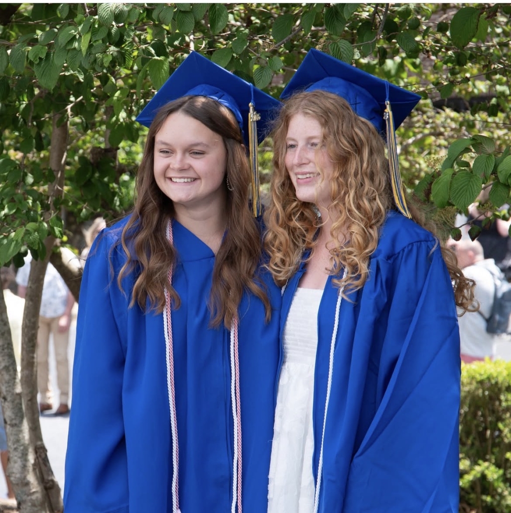 Ryah in regalia with East alumna