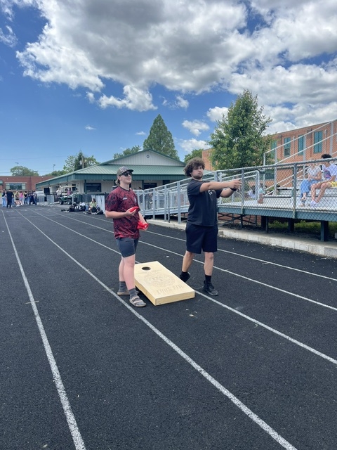 Caleb and Mica throwing bags
